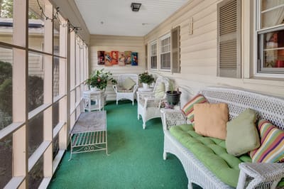 Cozy outdoor sitting area with wicker furniture