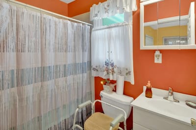 Brightly colored bathroom with floral decor
