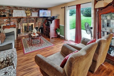 Cozy common area with comfortable seating and a fireplace