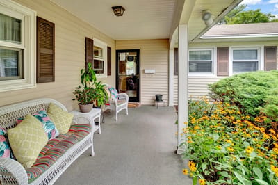 Welcoming porch with plants and flowers