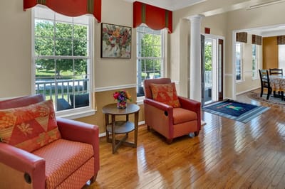 Bright common area with seating and a view of the outdoors