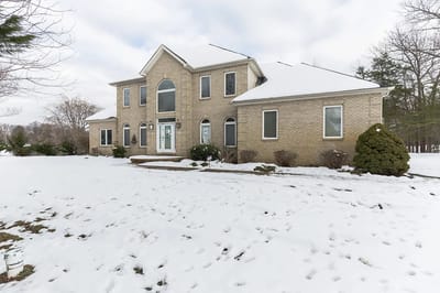 Exterior view of a facility in winter with snow