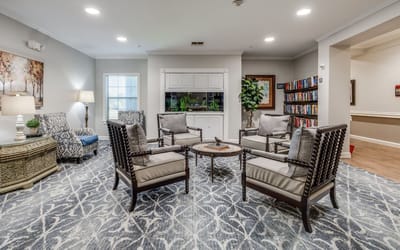 Common area with comfortable seating and library