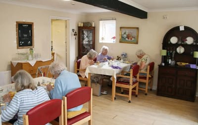 Residents enjoying lunch in a dining room