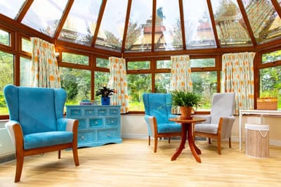 Bright communal area with seating and natural light