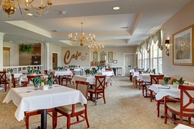 Interior view of the dining area with tables and decor