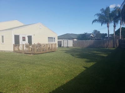 Exterior view of a senior living facility with outdoor space