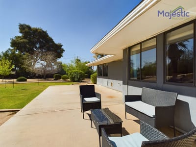 Outdoor seating area with a view of the lawn