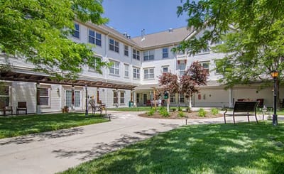 Outdoor courtyard with seating and greenery