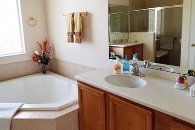 Cozy bathroom with a tub and sink