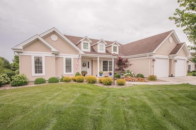 Exterior view of a well-maintained assisted living facility.