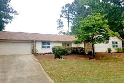 Cherokees Angel Personal Care Home, Nursing Home in Canton, GA — Residential building surrounded by greenery and landscaping