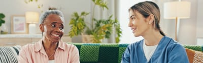 Cherokees Angel Personal Care Home, Nursing Home in Canton, GA — Two women conversing in a cozy common area