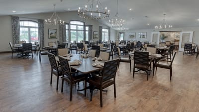 Elegant dining room setup with tables and chairs