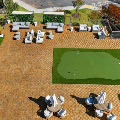 Aerial view of a landscaped outdoor area with seating