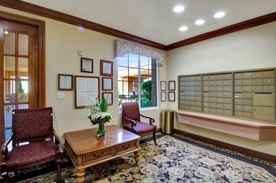 Common area of a senior living facility with mailboxes