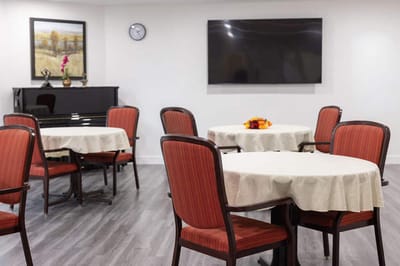 Interior of a common area with tables and chairs