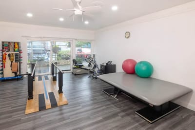 Well-equipped therapy room with exercise equipment