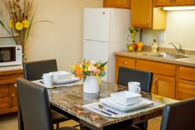 Cozy dining area with a flower centerpiece