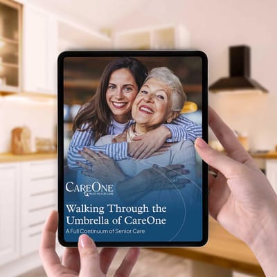 Company logo with photo of a caregiver and resident