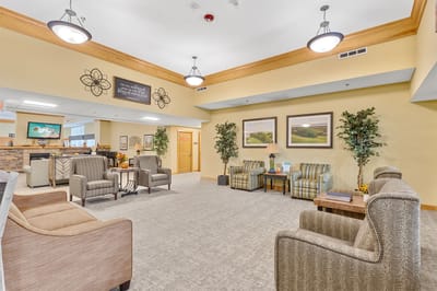 Bright common area with comfortable seating and decor