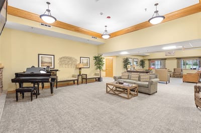 Common area with cozy seating and piano