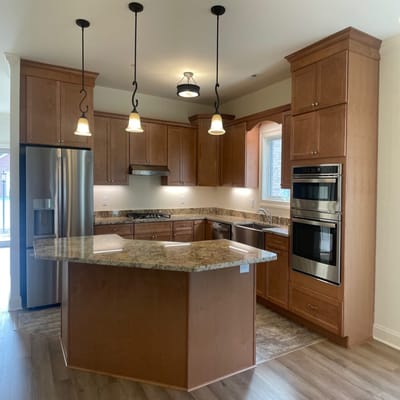 Modern kitchen with granite countertops and appliances