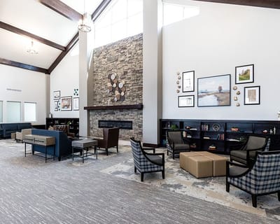 Bright common area with comfortable seating and decor
