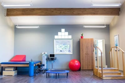 Interior therapy room with equipment and therapy tools