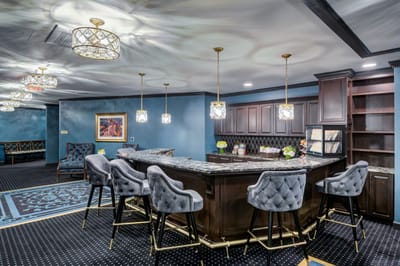 Interior view of a stylish common area with a bar