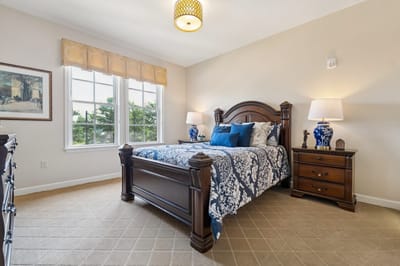Well-furnished resident room with natural light