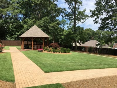 Well-maintained outdoor garden with gazebo