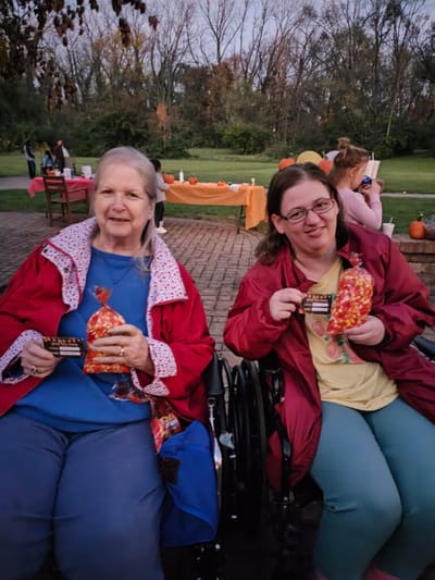 Two residents enjoying an outdoor event