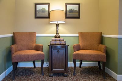 Cozy seating area with lamps and decor