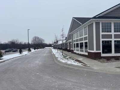 Exterior view of Hampton Manor building in winter