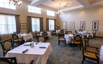 Well-set dining area in a senior living facility