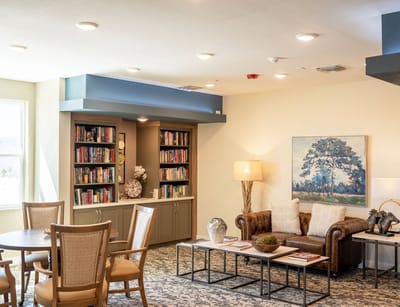 Cozy common area with bookshelves and seating