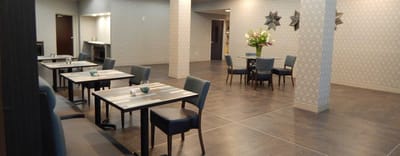 Interior common area with tables and chairs