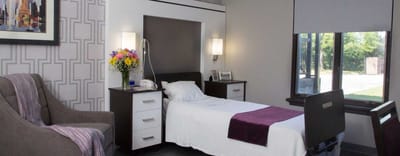 Cozy resident room with bed and decor