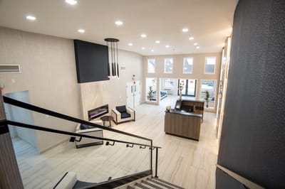 Bright interior lobby with seating area and reception desk