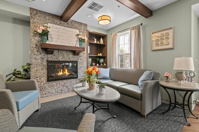 Cozy common area with a fireplace and seating