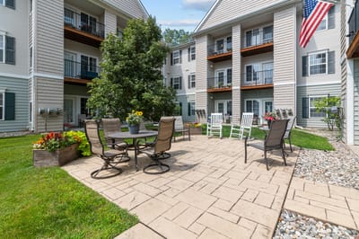 Outdoor seating area with garden and patio