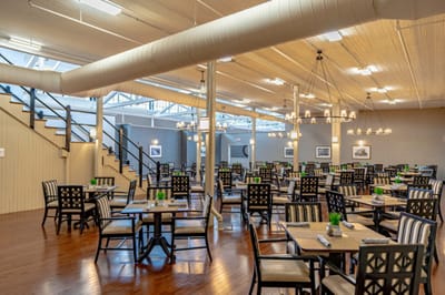 Bright dining room with tables and chairs