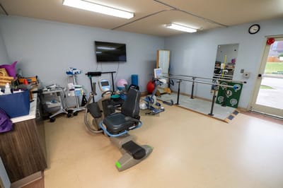 Therapy room with exercise equipment and rehabilitation tools