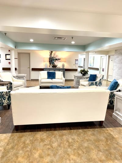 Bright common area with comfortable seating and decor