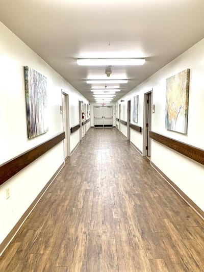 Bright hallway with art on the walls