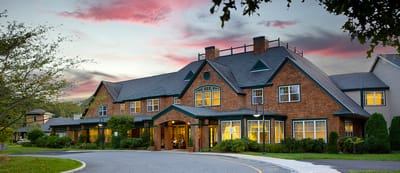 Exterior view of Laurentide at Mashpee Commons during sunset