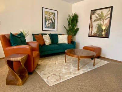 Cozy living room with comfortable seating and artwork