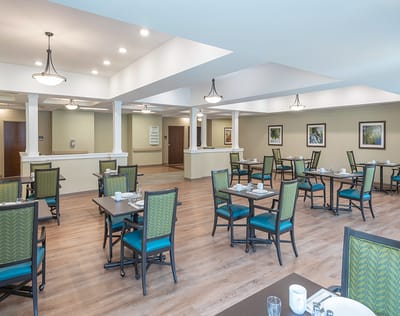 Bright dining room with tables and chairs