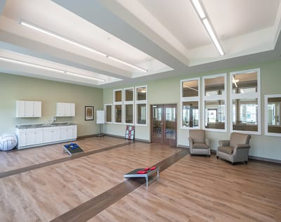 Bright and spacious activity room with seating